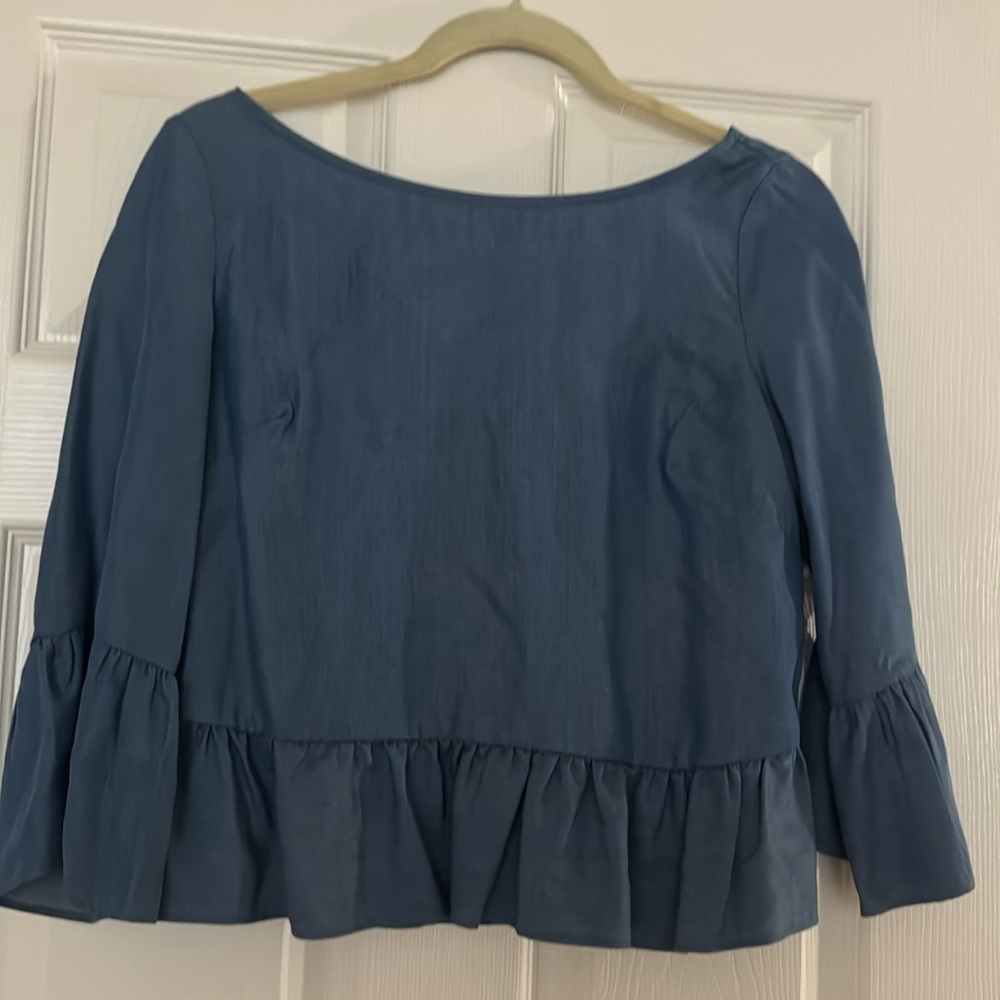 Bebe blouse 3/4 sleeve with silver buttons in the back